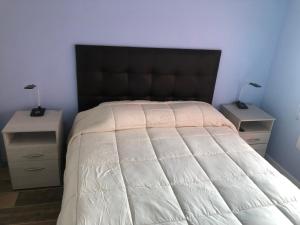 Cama ou camas em um quarto em Mirador del Kaiken