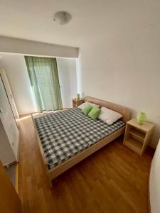 A bed or beds in a room at Apartments Elvira