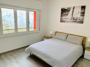 Letto o letti in una camera di Casa Meni