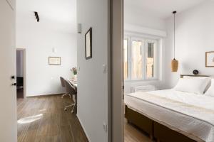 Postel nebo postele na pokoji v ubytování Leonidas - Annunziata Luxury Penthouse