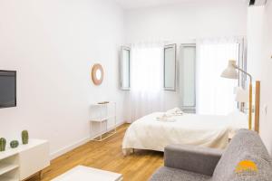 Posteľ alebo postele v izbe v ubytovaní Estudio Gaviota by Cadiz Time