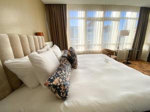 Ένα ή περισσότερα κρεβάτια σε δωμάτιο στο Boutique Hotel Jersey