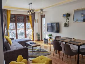 Μια τηλεόραση ή/και κέντρο ψυχαγωγίας στο Apartman 37 Wellness@Spa Zlatibor