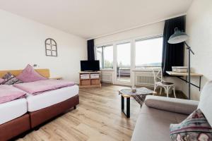 Postel nebo postele na pokoji v ubytování Landpension Pferdekoppel - B&B - Self Checkin