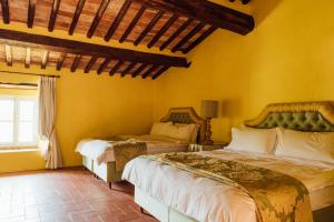 Postel nebo postele na pokoji v ubytování Buonvisi B&B