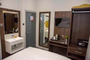 TV a/nebo společenská místnost v ubytování Howard Winchester Hotel + 20 fotografií
