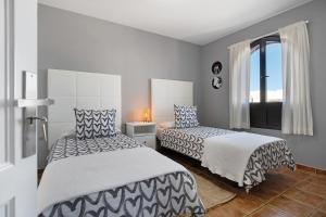 Postel nebo postele na pokoji v ubytování Apartamentos La Estrella iii