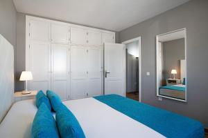 Postel nebo postele na pokoji v ubytování Apartamentos La Estrella iii