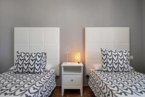 Postel nebo postele na pokoji v ubytování Apartamentos La Estrella iii