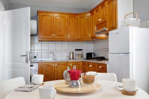 Kuchyň nebo kuchyňský kout v ubytování Apartamentos La Estrella iii