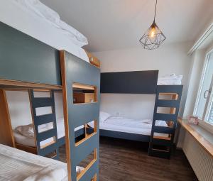 Postel nebo postele na pokoji v ubytování Hostel by Hyve Basel