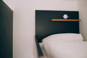 Postel nebo postele na pokoji v ubytování Hostel by Hyve Basel