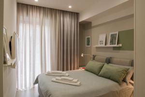 En eller flere senge i et værelse på Leflole Napoli