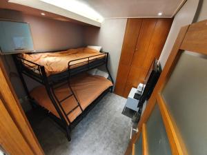 Ένα ή περισσότερα κρεβάτια σε δωμάτιο στο Dalgona Guesthouse
