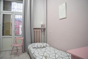 Postel nebo postele na pokoji v ubytování Moon Hostel Warszawa