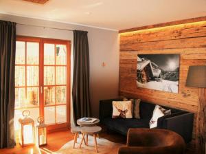 O zonă de relaxare la Ski-in & Out Alpine Style Apartment near Kitzbühel