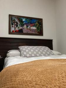 Llit o llits en una habitació de Hotel Boutique Colonial Cartago