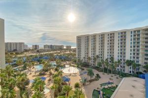 an aerial view of a resort with a pool and palm trees at The Palms of Destin II in Destin