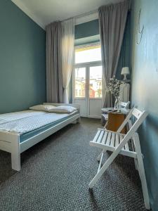 Postel nebo postele na pokoji v ubytování Moon Hostel Warszawa
