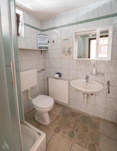 Koupelna v ubytování Villa Goga