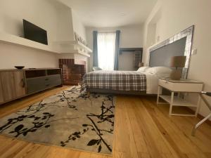 TV a/nebo společenská místnost v ubytování Casa Saudade luxury rooms
