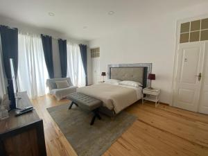Postel nebo postele na pokoji v ubytování Casa Saudade luxury rooms
