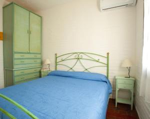 Katil atau katil-katil dalam bilik di Appartamento Con Accesso Spiaggia