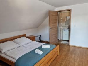 Cama ou camas em um quarto em Starý dom