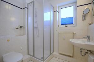 Koupelna v ubytování Residenz Düne III Wohnung 12 + 28 fotografií