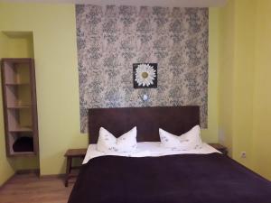 Postel nebo postele na pokoji v ubytování Hotel Wittenberg-Hotel Garni