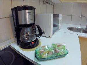 Kuchyňa alebo kuchynka v ubytovaní ConilPlus apartments AZORIN II