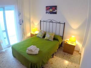 Posteľ alebo postele v izbe v ubytovaní ConilPlus apartments AZORIN II