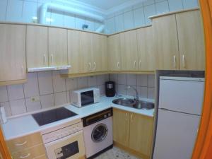 Kuchyňa alebo kuchynka v ubytovaní ConilPlus apartments AZORIN II