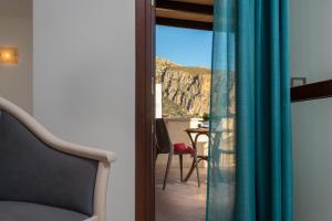 a view from a room with a view of a table at Helios Hotel in San Vito lo Capo
