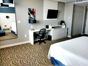 TV a/nebo společenská místnost v ubytování Holiday Inn Express Pachuca by IHG
