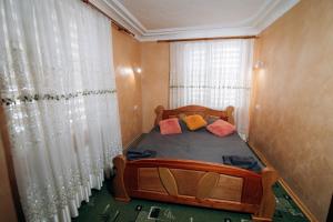 Postel nebo postele na pokoji v ubytování Садиба Федорчуків Гірська хатина 1