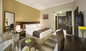 Una cama o camas en una habitación de Gateway Hotel