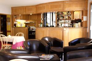 Posezení v ubytování Chez Terrassier - Logis Hôtels - Hotel et Restaurant
