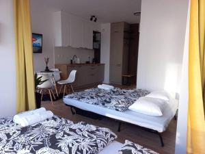 Tempat tidur dalam kamar di Apartament blisko morza i stadionu Polsat Plus Arena Gdańsk