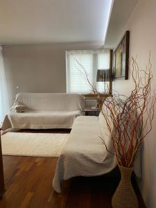 Posteľ alebo postele v izbe v ubytovaní APARTAMENT LUCYNA