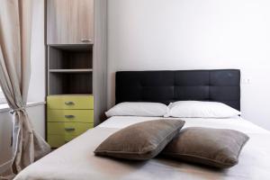 Postel nebo postele na pokoji v ubytování San Matteo Maison