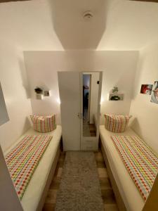 Ένα ή περισσότερα κρεβάτια σε δωμάτιο στο Moderne und komfortable Appartements im Ferienpark Hahnenklee