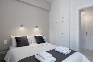 Posteľ alebo postele v izbe v ubytovaní West City Apartment