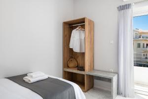 Posteľ alebo postele v izbe v ubytovaní West City Apartment