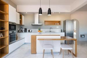 Kuchyňa alebo kuchynka v ubytovaní West City Apartment