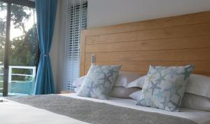 Postel nebo postele na pokoji v ubytování Lyla Beach Villa