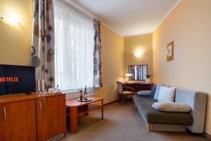 Posezení v ubytování Hotel U Vlašského Dvora + 7 fotografií