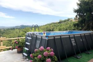 Bazén v ubytování Casa di nonna Ines 1 - Hideaway in Monferrato con Vista sulle Colline, Solarium e Piscina nebo v jeho okolí