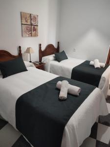 Krevet ili kreveti u jedinici u okviru objekta Hostal El Fogon De Felisa