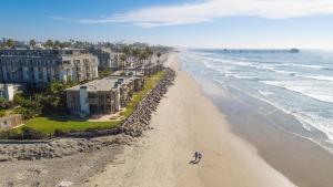 an aerial view of the beach and ocean at E109 - Starfish Villa in Oceanside